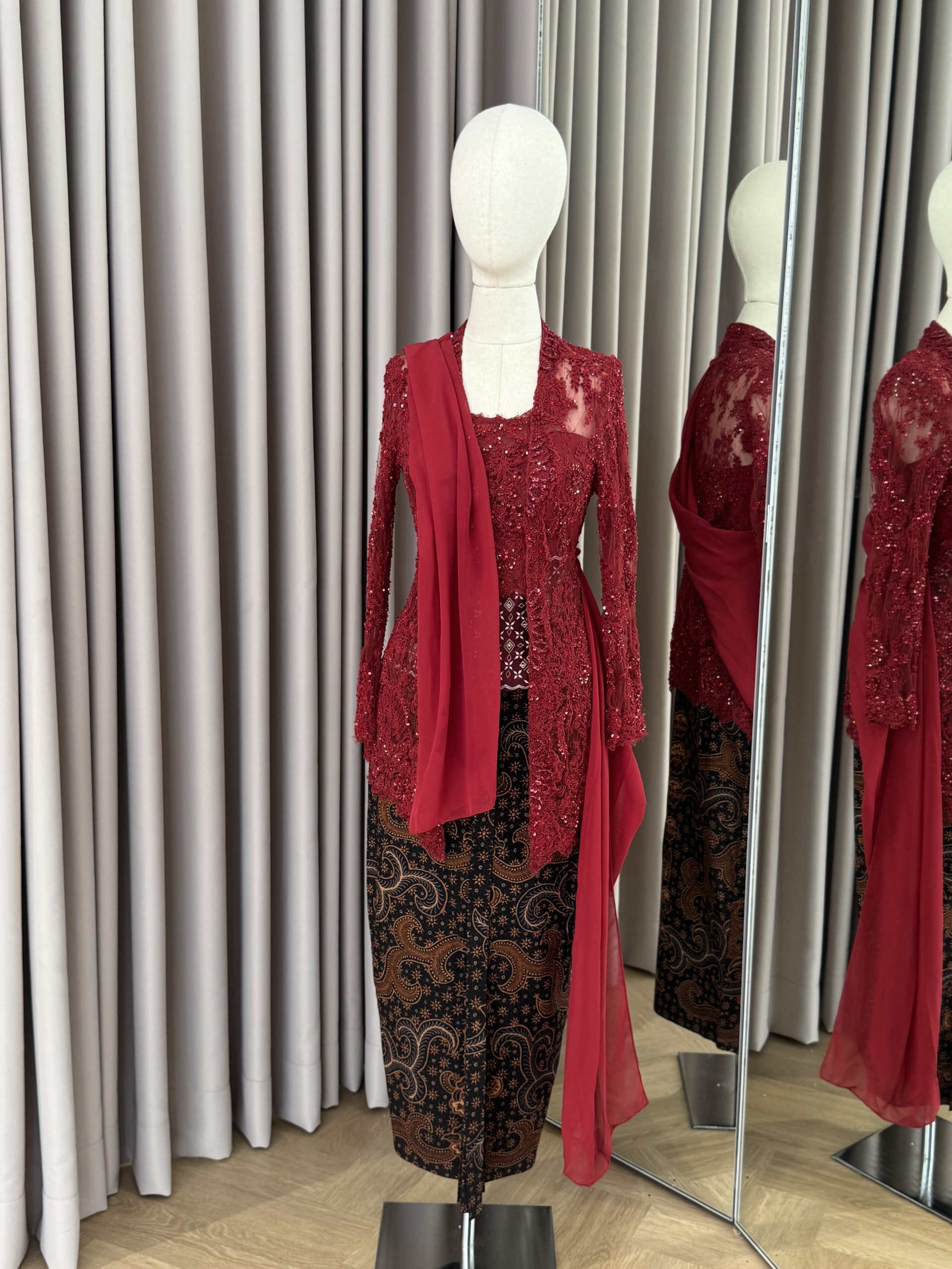 Red Kebaya by Didiet Maulana