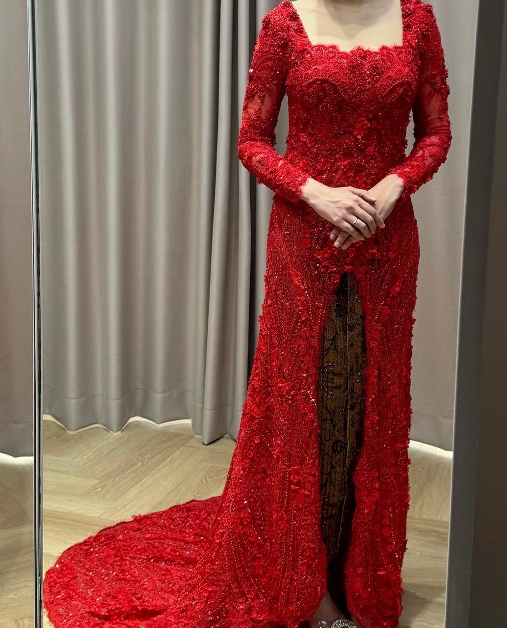 Red Kebaya by Didiet Maulana